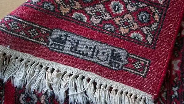 Даты и подписи на коврах ручной работы